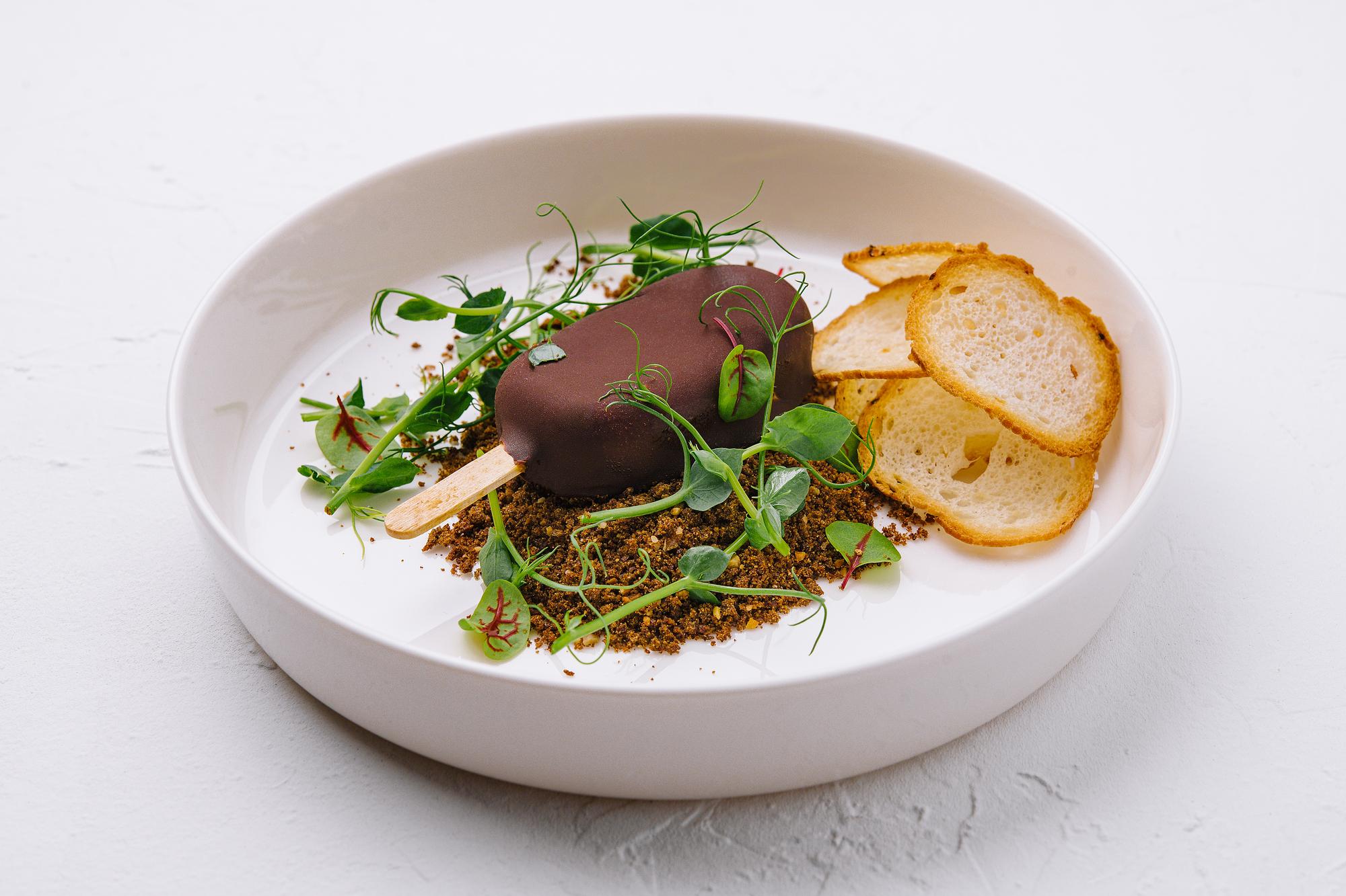 Finished plated dish with herbs